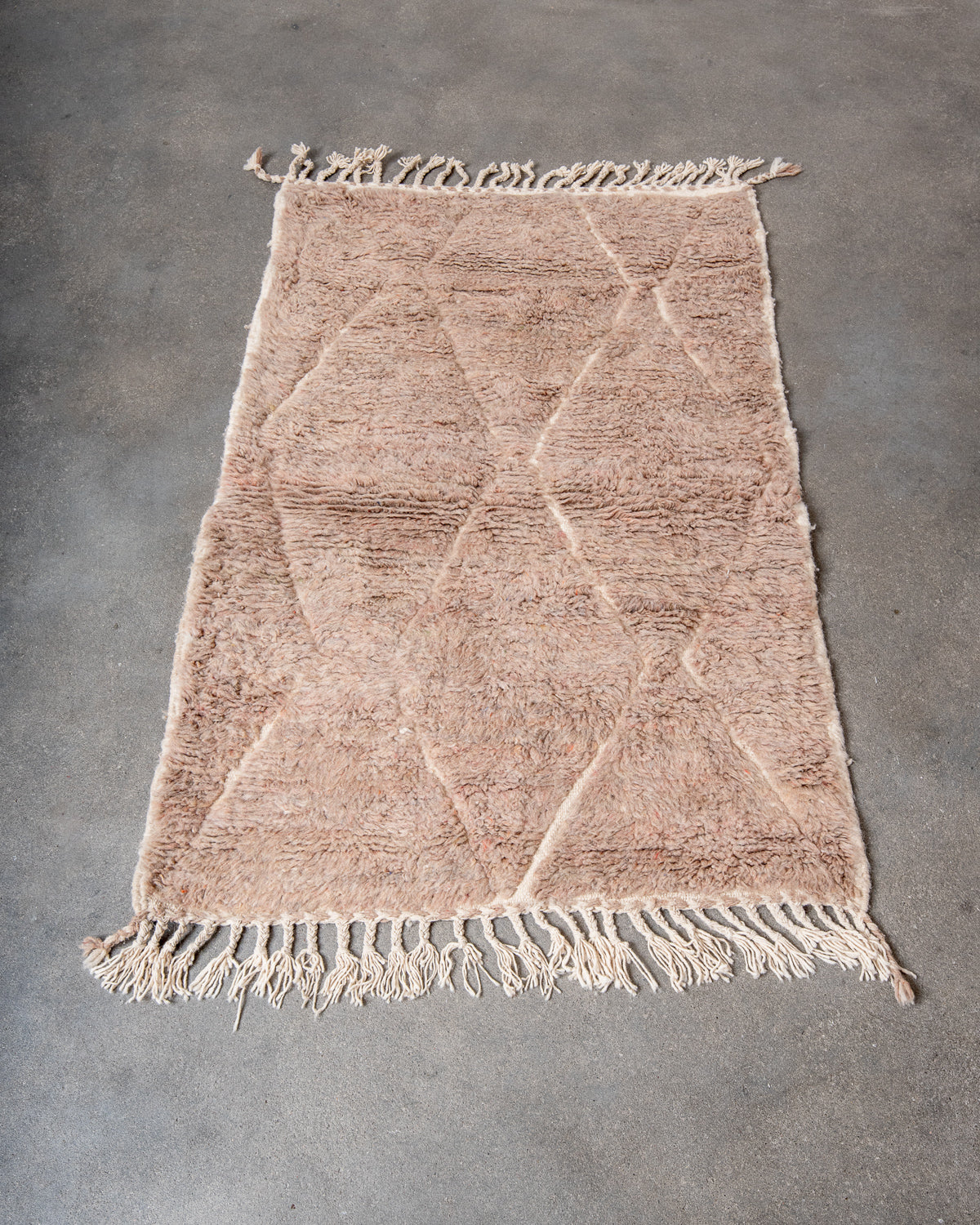 Modern, designer, handcrafted Berber rug from Morocco. Beniourain carpet with beautiful colours and patterns and fluffy wool texture.